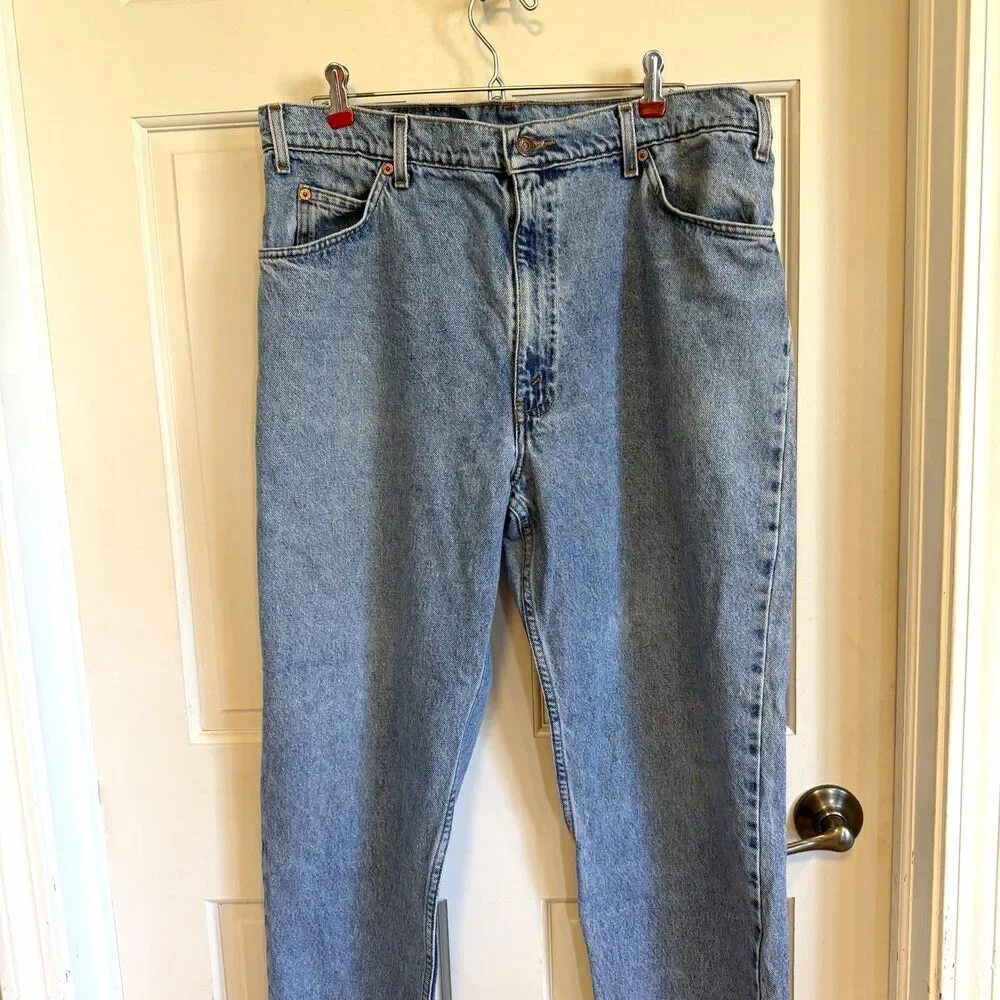 Vintage Levi’s 550 Jeans Men’s 38x30 Relaxed Fit Tapered Leg Light Wash orange